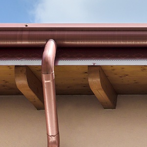 Copper gutter and spout.