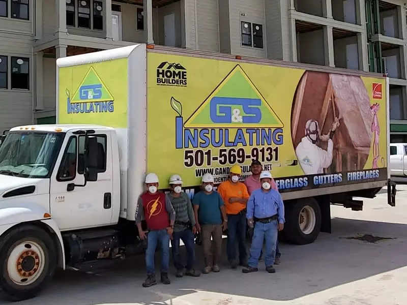 Six members of the G&S Insulating team standing in front of a company truck in Arkansas.