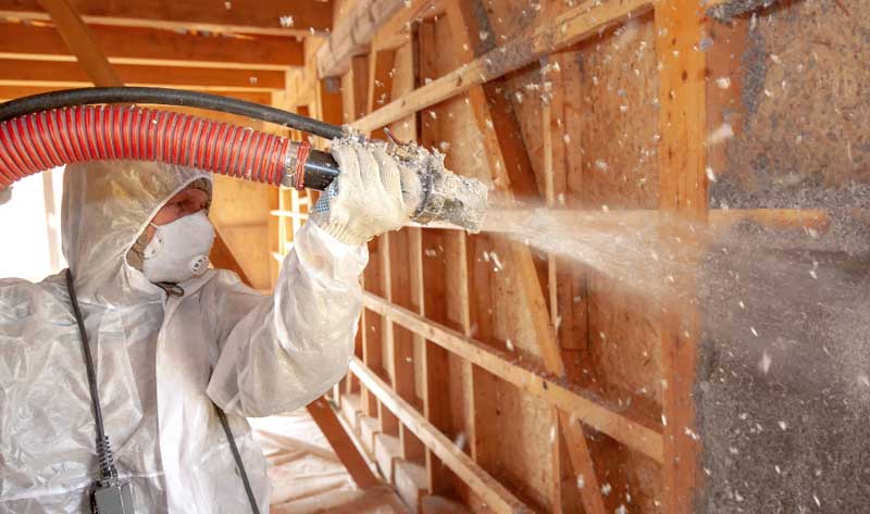 cellulose insulation installer, insulating home's walls.