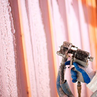 spray foam installer, installing spray foam insulation in home's walls