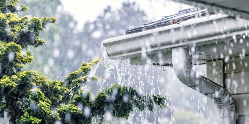 close-up view of rain on home's gutters