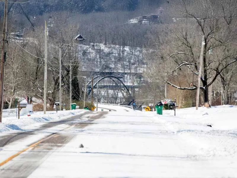 Rainbow Bridge at Cotter in winter snow.