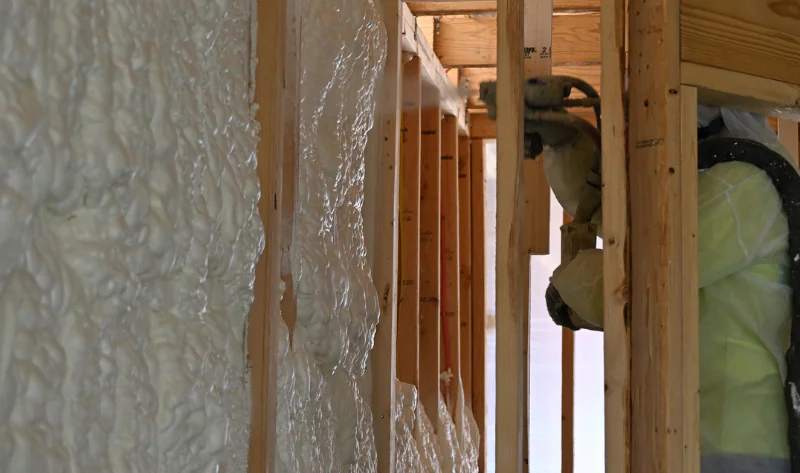 closed-cell-spray-foam spray foam installer installer, closed cell spray foam on wall.