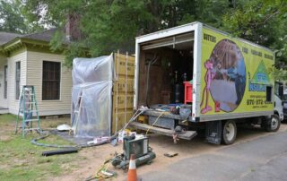 G&S Insulating service truck with equipment set up at a storage container spray foam job site in Little Rock, AR.