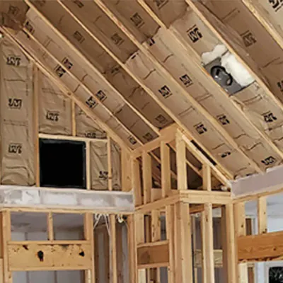 Fiberglass insulation installed in new home's ceiling.
