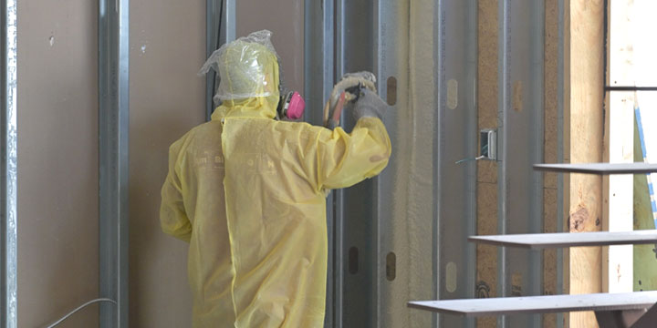 G&S Insulating closed-cell spray foam application on metal stud wall in Little Rock, AR.