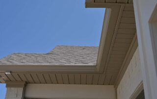G&S Insulating gutter and roofline detail on a home exterior. G&S Insulating gutter and roofline detail on a home exterior in Little Rock, AR.